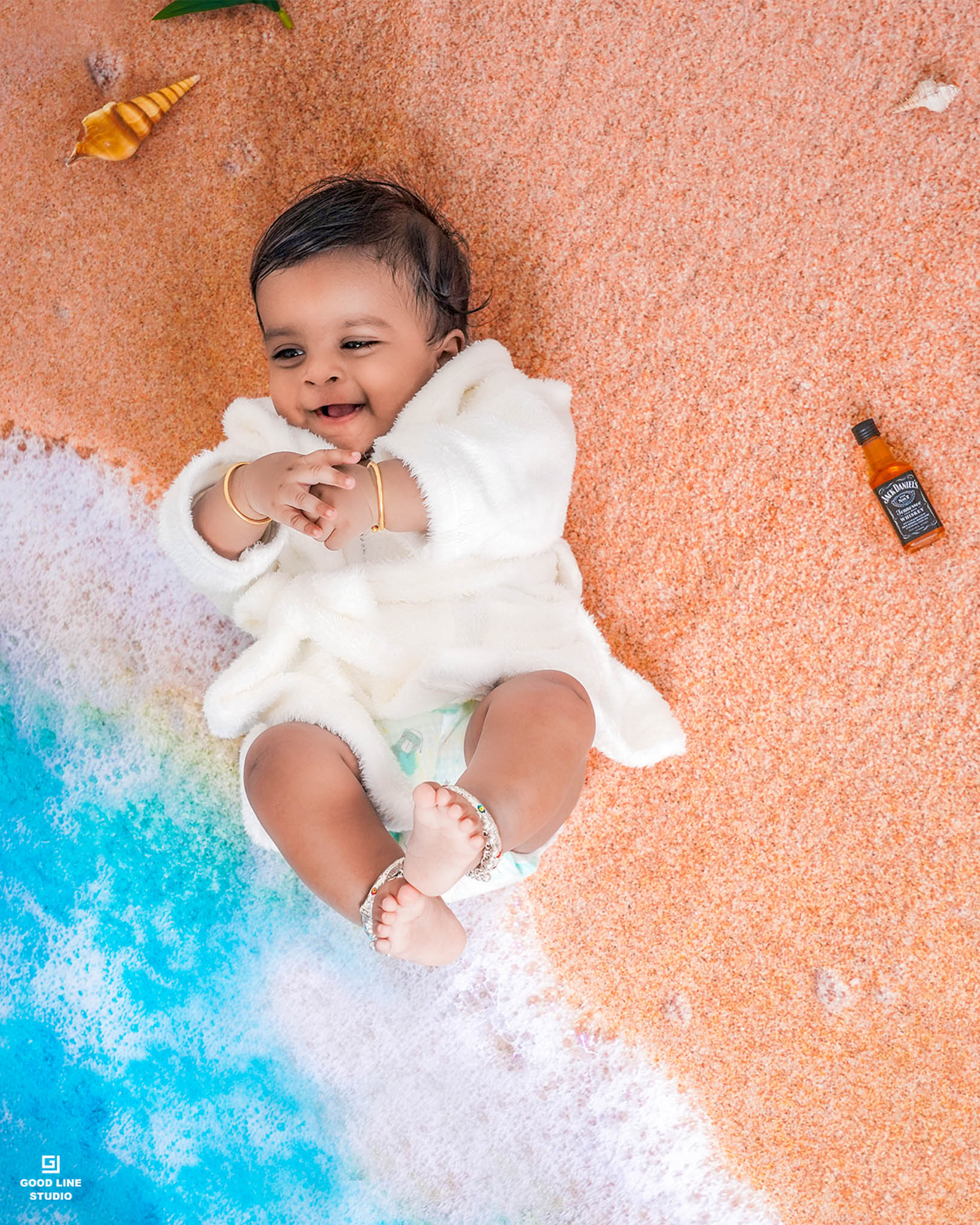 Smiling baby during a professional photoshoot